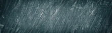 Old Gray Scratched And Stained Metal Wide Texture. Shabby Metallic Surface Panorama. Dark Retro Grunge Panoramic Background