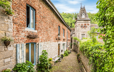 Wall Mural - Oldest narrow and paved cobblestone street in Durbuy, Belgium.