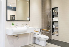 Interior Of Bathroom For The Disabled Or Elderly People. Handrail For Disabled And Elderly People In The Bathroom