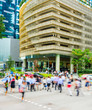 © joyt - Crowded crossroad, business Singapore downtown