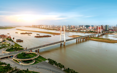 Wall Mural - Aerial view of the city and modern bridge