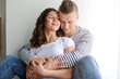 © Pixel-Shot - Adorable loving couple resting at home