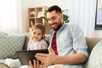 Sticker - family, fatherhood and technology concept - happy father and little daughter with tablet pc computer at home