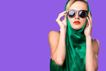Portrait Of A Beautiful Sexy Blonde In Green Dress, Sunglasses And Head Scarf. Summer, Spring Fashion Woman
