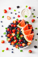 Wall Mural - fruit and berry platter over white. blueberry, strawberry, raspberry, blackberry, watermelon