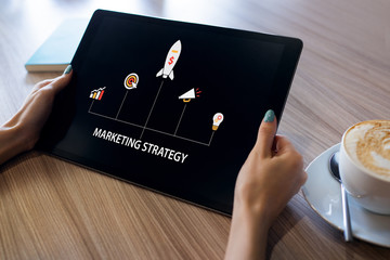 Marketing strategy diagram on device screen. Business concept.