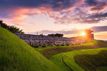 Hwaseong Fortress In Sunset, Traditional Architecture Of Korea At Suwon, South Korea.