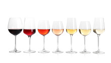 Row Of Glasses With Different Wines On White Background