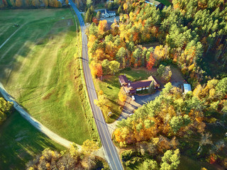 Wall Mural - Scenic highway at autumn in New Hampshire, USA. Fall in New England. Aerial drone shot.
