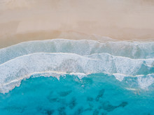 Aerial View Of Sand Beach, Ocean Texture Background Looping, Top Down View Of Sea Waves By Drone.