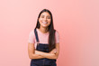 © Asier - Young pretty arab woman wearing a jeans dungaree laughing and having fun.