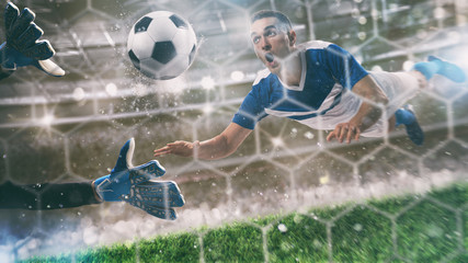 goalkeeper catches the ball in the stadium during a football game