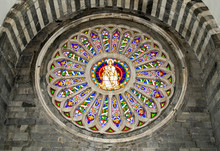 Close-up Of The Neo-gothic Rose Window "Mary With Baby Jesus" (15th Century) In The Cathedral Of St Lawrence (9-17th Centuries), A Roman Catholic Cathedral In Genoa, Liguria, Italy  
