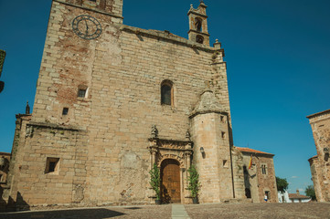 Wall Mural - Gothic church facade with steeples and wooden door at Caceres