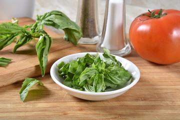 Sticker - Fresh basil leaves on a cutting board