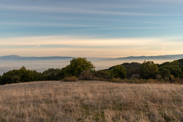 Sunset on silicon valley as seen from the top of Monte Bello open space above Palo Alto, California