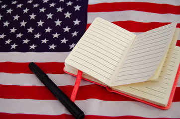 Wall Mural - Usa flag with notebook, diary , copy space