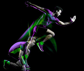 Wall Mural - one caucasian runner running jogger jogging man light painting speed effect isolated on black backgr