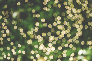 Leinwandbilder - Abstract blur decoration ball and light string on christmas tree with bokeh light background.winter holiday seasonal.