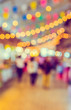 blur image of people in food festival with bokeh .
