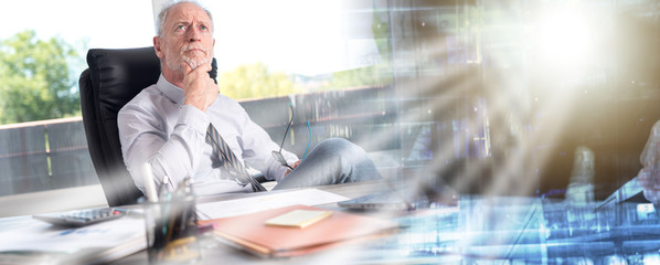 Wall Mural - Portrait of thoughtful businessman sitting; multiple exposure