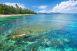 © soft_light - woman in swimsuit snorkeling in tropical sea near corals reef