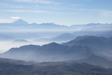 Fototapeta Natura - Misty blue Andean mountain landscape background