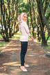 © SafwanAbdRahman - Young attractive Muslim Malay woman, modern contemporary fashion in hijab, close up portrait face and body, blurred background smiling and happy at park.