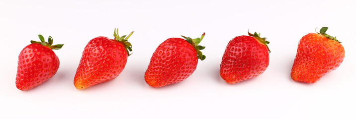 Poster - Strawberries on a white background in a row