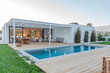 canvas print picture - Modern villa with pool and garden