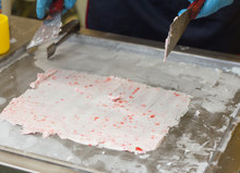 Preparation Of Frozen Rolls Of Cream And Strawberries