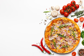 Pizza With Ham And Rocket Salad On White Background With Ingredients Around