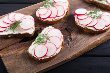 Wall Mural - Healthy vegetable toasts sandwith with radish and dill