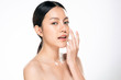 © kitthanes  - Beautiful Young asian Woman with Clean Fresh Skin on white background,