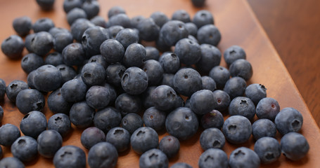 Canvas Print - Stack of blueberry on the wooden plate