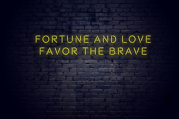 Wall Mural - Neon sign with positive wise motivational quote against brick wall 