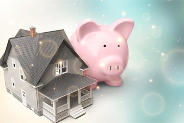 Wall Mural - Small House and Piggy bank on background