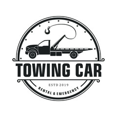 Silhouette towing car logo design