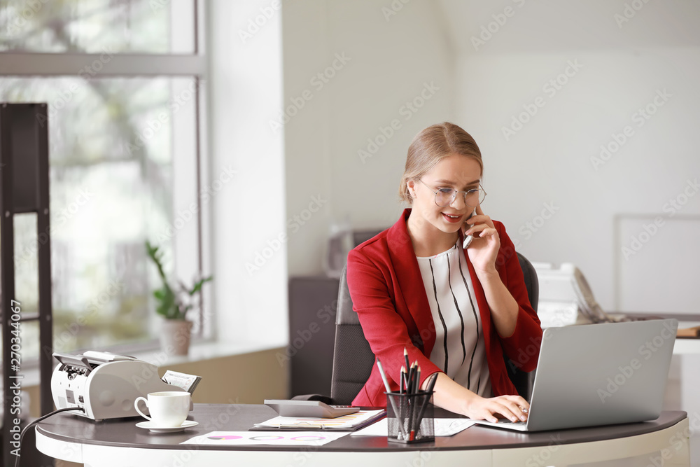 Female accountant working in office