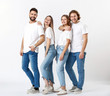 © Pixel-Shot - Stylish young people in jeans on white background