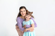 © Pixel-Shot - Happy mother with little adopted girl on white background