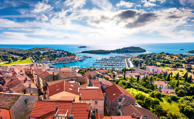 Wall Mural - Aerial view of the port of Vrsar (Orsera) town. Colorful spring cityscape of Croatia, Europe. Traveling concept background. Magnificent Mediterranean seascape.