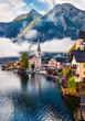 © Andrew Mayovskyy - Sunny autumn scene of Hallstatt lake. Splendid morning viev of Hallstatt village, in Austria's mountainous Salzkammergut region, Austria. Beauty of countryside concept background.