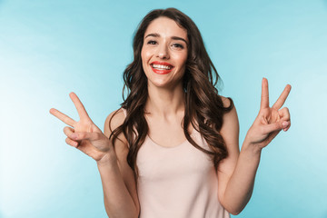 Poster - Portrait of a beautiful young brunette woman standing