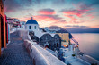 Dramatic morning view of Santorini island. Picturesque spring sunrise on the famous Greek resort Oia, Greece, Europe. Traveling concept background. Artistic style post processed photo.