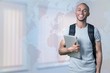 © BillionPhotos.com - Portrait of smiling young african college student