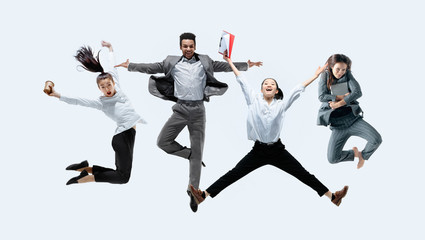 let's start with aroma coffee. happy office workers jumping and dancing in casual clothes or suit wi