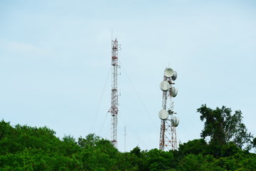 High pole for signal transmission. There are both wireless phone systems and microwave systems. 