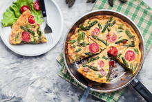 Frittata Made Of Eggs, Asparagus And Tomatoes