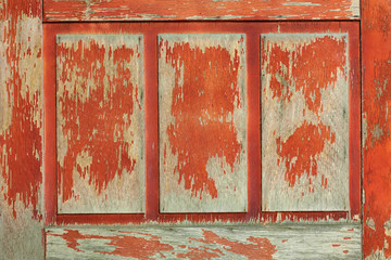 old wooden door of red color for texture or background